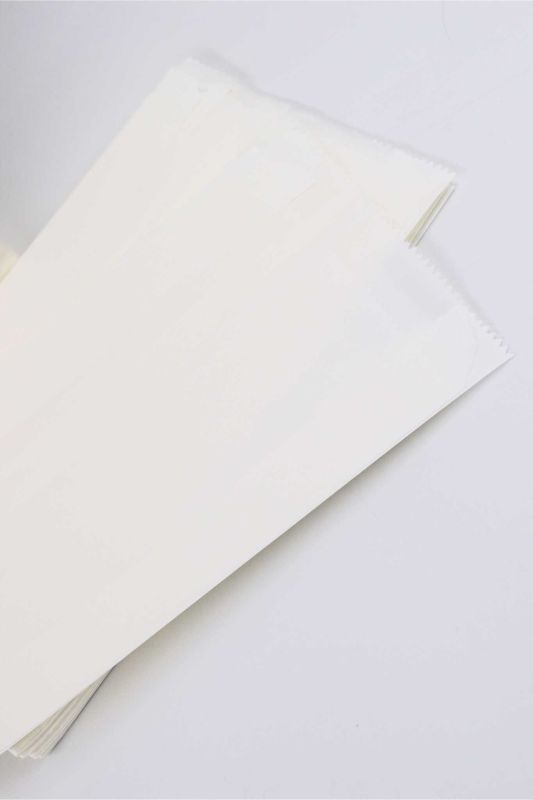 Torebka papierowa fałdowa biała 14x5x27cm 100 szt.